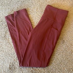 ATHLETA slash pocket salutation tight legging